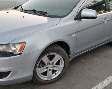 Серый Мицубиси Лансер, объемом двигателя 1.5 л и пробегом 201 тыс. км за 5600 $, фото 6 на Automoto.ua