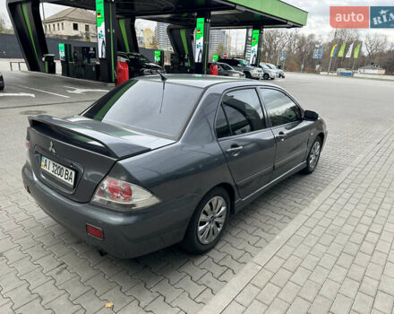 Сірий Міцубісі Lancer, об'ємом двигуна 1.6 л та пробігом 115 тис. км за 2800 $, фото 4 на Automoto.ua