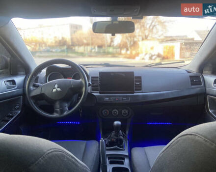 Серый Мицубиси Лансер, объемом двигателя 1.5 л и пробегом 224 тыс. км за 6300 $, фото 8 на Automoto.ua