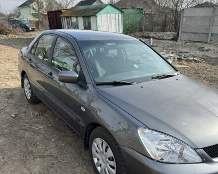 Серый Мицубиси Лансер, объемом двигателя 1.6 л и пробегом 129 тыс. км за 5000 $, фото 7 на Automoto.ua