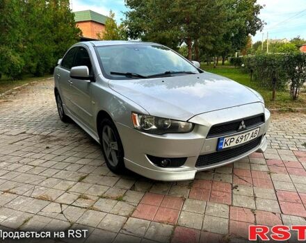 Серый Мицубиси Лансер, объемом двигателя 2 л и пробегом 250 тыс. км за 6000 $, фото 1 на Automoto.ua