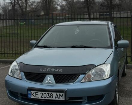 Серый Мицубиси Лансер, объемом двигателя 1.6 л и пробегом 238 тыс. км за 4300 $, фото 21 на Automoto.ua