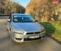Серый Мицубиси Лансер, объемом двигателя 2 л и пробегом 270 тыс. км за 6500 $, фото 1 на Automoto.ua