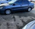 Серый Мицубиси Лансер, объемом двигателя 1.6 л и пробегом 0 тыс. км за 3600 $, фото 1 на Automoto.ua