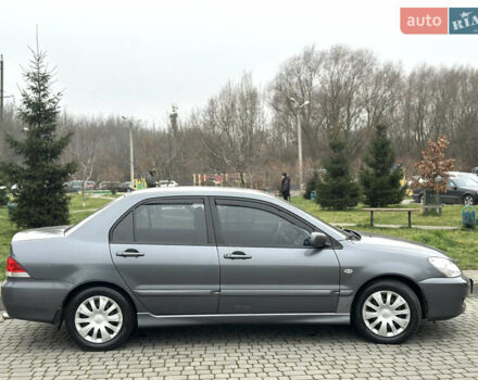Сірий Міцубісі Lancer, об'ємом двигуна 1.6 л та пробігом 177 тис. км за 2800 $, фото 10 на Automoto.ua