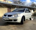 Сірий Міцубісі Lancer, об'ємом двигуна 1.6 л та пробігом 207 тис. км за 5000 $, фото 2 на Automoto.ua