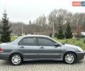 Сірий Міцубісі Lancer, об'ємом двигуна 1.6 л та пробігом 177 тис. км за 2800 $, фото 10 на Automoto.ua