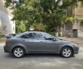 Сірий Міцубісі Lancer, об'ємом двигуна 2 л та пробігом 190 тис. км за 7100 $, фото 5 на Automoto.ua