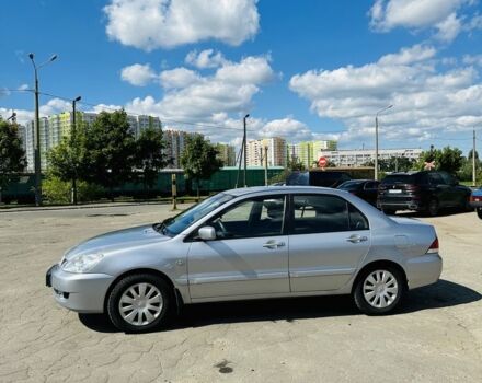 Сірий Міцубісі Lancer, об'ємом двигуна 1.6 л та пробігом 269 тис. км за 4700 $, фото 4 на Automoto.ua