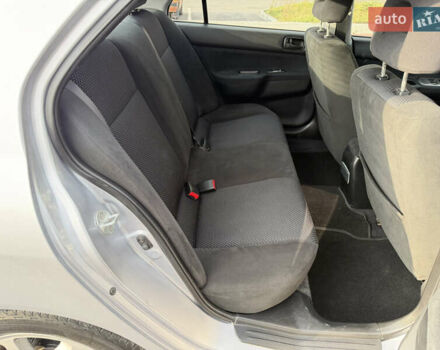 Серый Мицубиси Лансер, объемом двигателя 1.3 л и пробегом 160 тыс. км за 5555 $, фото 68 на Automoto.ua