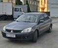 Серый Мицубиси Лансер, объемом двигателя 1.6 л и пробегом 290 тыс. км за 4035 $, фото 1 на Automoto.ua