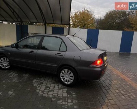 Сірий Міцубісі Lancer, об'ємом двигуна 1.6 л та пробігом 330 тис. км за 3500 $, фото 27 на Automoto.ua