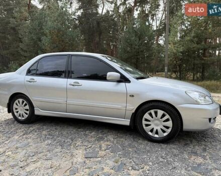 Серый Мицубиси Лансер, объемом двигателя 1.6 л и пробегом 200 тыс. км за 4400 $, фото 5 на Automoto.ua