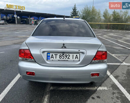 Серый Мицубиси Лансер, объемом двигателя 1.58 л и пробегом 232 тыс. км за 4900 $, фото 3 на Automoto.ua