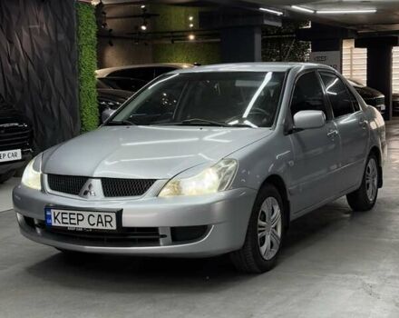 Серый Мицубиси Лансер, объемом двигателя 1.58 л и пробегом 271 тыс. км за 4200 $, фото 5 на Automoto.ua