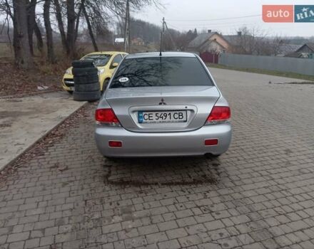 Серый Мицубиси Лансер, объемом двигателя 1.6 л и пробегом 175 тыс. км за 4200 $, фото 10 на Automoto.ua