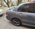 Сірий Міцубісі Lancer, об'ємом двигуна 1.58 л та пробігом 250 тис. км за 4750 $, фото 3 на Automoto.ua