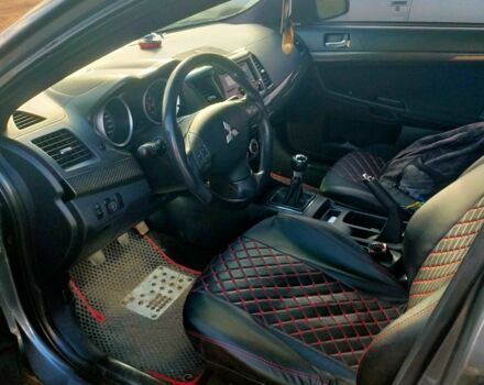 Серый Мицубиси Лансер, объемом двигателя 2 л и пробегом 351 тыс. км за 7000 $, фото 9 на Automoto.ua