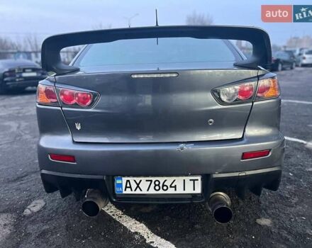 Серый Мицубиси Лансер, объемом двигателя 2 л и пробегом 170 тыс. км за 6999 $, фото 7 на Automoto.ua