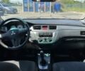 Серый Мицубиси Лансер, объемом двигателя 1.6 л и пробегом 130 тыс. км за 3999 $, фото 4 на Automoto.ua