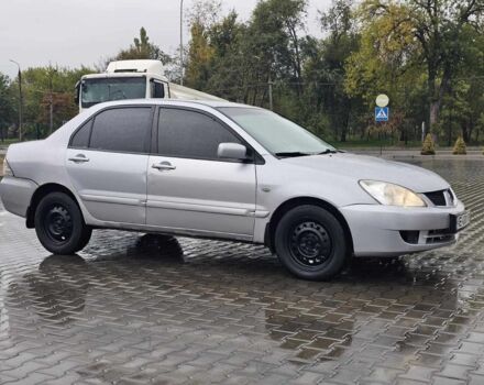 Серый Мицубиси Лансер, объемом двигателя 1.6 л и пробегом 300 тыс. км за 3250 $, фото 5 на Automoto.ua