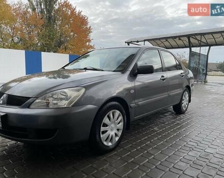 Сірий Міцубісі Lancer, об'ємом двигуна 1.6 л та пробігом 330 тис. км за 3500 $, фото 20 на Automoto.ua