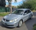 Сірий Міцубісі Lancer, об'ємом двигуна 1.6 л та пробігом 237 тис. км за 2500 $, фото 1 на Automoto.ua