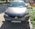 Сірий Міцубісі Lancer, об'ємом двигуна 1.6 л та пробігом 205 тис. км за 3800 $, фото 1 на Automoto.ua