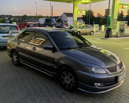 Серый Мицубиси Лансер, объемом двигателя 1.6 л и пробегом 280 тыс. км за 4000 $, фото 6 на Automoto.ua