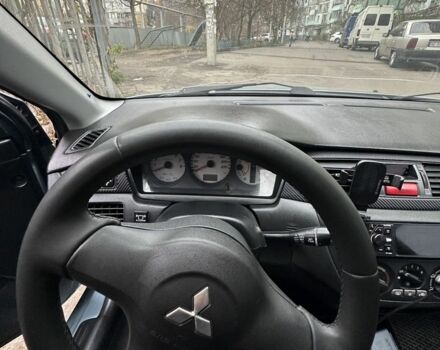 Серый Мицубиси Лансер, объемом двигателя 1.6 л и пробегом 238 тыс. км за 4300 $, фото 10 на Automoto.ua