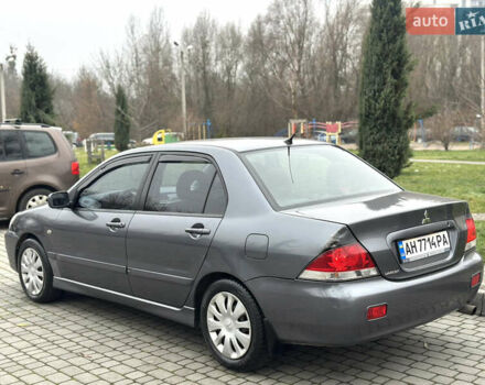 Сірий Міцубісі Lancer, об'ємом двигуна 1.6 л та пробігом 177 тис. км за 2800 $, фото 3 на Automoto.ua
