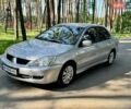Серый Мицубиси Лансер, объемом двигателя 1.6 л и пробегом 193 тыс. км за 5999 $, фото 1 на Automoto.ua