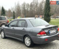 Сірий Міцубісі Lancer, об'ємом двигуна 1.6 л та пробігом 177 тис. км за 2800 $, фото 3 на Automoto.ua