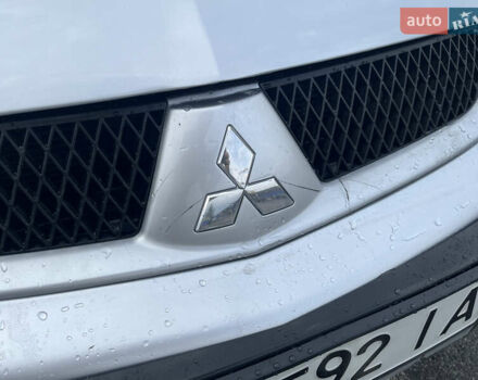 Серый Мицубиси Лансер, объемом двигателя 1.58 л и пробегом 232 тыс. км за 4900 $, фото 5 на Automoto.ua