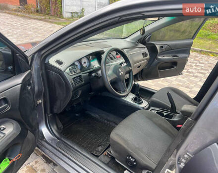 Міцубісі Lancer 2007 у Белой Церкве на Automoto.ua Сірий Міцубісі Lancer, об'ємом двигуна 1.58 л та пробігом 254 тис. км за 3200 $, фото 11 на Automoto.ua