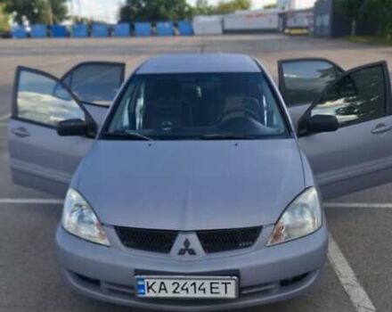 Серый Мицубиси Лансер, объемом двигателя 1.6 л и пробегом 260 тыс. км за 4100 $, фото 16 на Automoto.ua