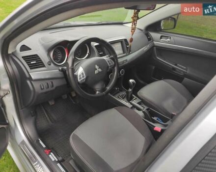 Сірий Міцубісі Lancer, об'ємом двигуна 2 л та пробігом 124 тис. км за 7499 $, фото 11 на Automoto.ua
