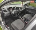 Сірий Міцубісі Lancer, об'ємом двигуна 2 л та пробігом 124 тис. км за 7499 $, фото 11 на Automoto.ua