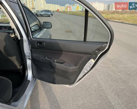 Сірий Міцубісі Lancer, об'ємом двигуна 1.3 л та пробігом 160 тис. км за 4999 $, фото 61 на Automoto.ua