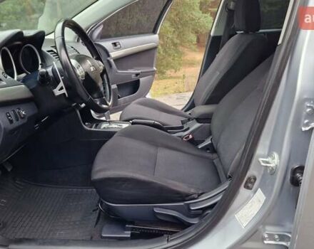 Серый Мицубиси Лансер, объемом двигателя 2 л и пробегом 213 тыс. км за 6550 $, фото 13 на Automoto.ua