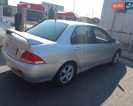 Серый Мицубиси Лансер, объемом двигателя 1.6 л и пробегом 210 тыс. км за 3500 $, фото 6 на Automoto.ua