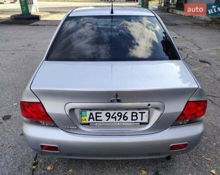 Сірий Міцубісі Lancer, об'ємом двигуна 1.58 л та пробігом 122 тис. км за 6300 $, фото 23 на Automoto.ua