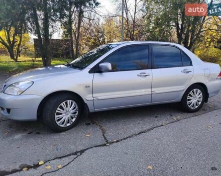 Сірий Міцубісі Lancer, об'ємом двигуна 1.58 л та пробігом 122 тис. км за 6300 $, фото 4 на Automoto.ua