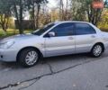 Сірий Міцубісі Lancer, об'ємом двигуна 1.58 л та пробігом 122 тис. км за 6300 $, фото 4 на Automoto.ua