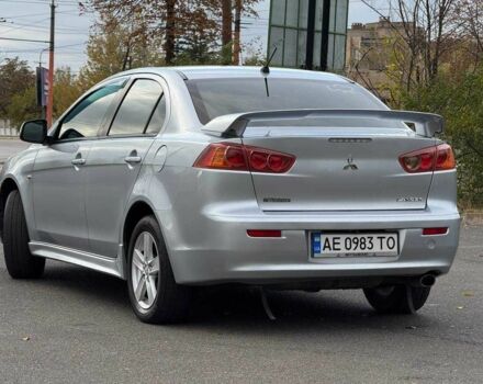 Серый Мицубиси Лансер, объемом двигателя 2 л и пробегом 207 тыс. км за 5800 $, фото 9 на Automoto.ua