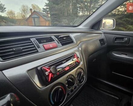 Сірий Міцубісі Lancer, об'ємом двигуна 1.6 л та пробігом 213 тис. км за 3600 $, фото 20 на Automoto.ua