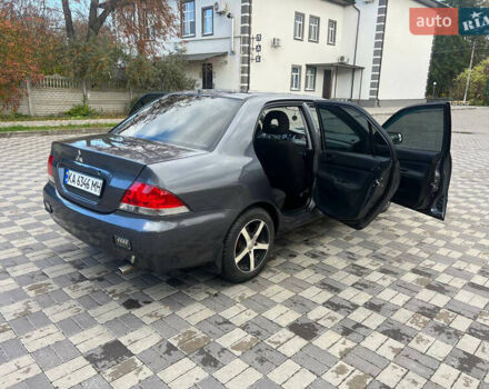 Міцубісі Lancer 2007 у Белой Церкве на Automoto.ua Сірий Міцубісі Lancer, об'ємом двигуна 1.58 л та пробігом 254 тис. км за 3200 $, фото 8 на Automoto.ua