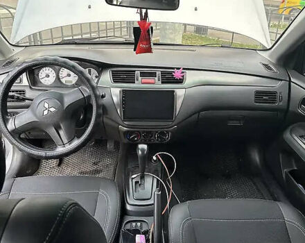 Сірий Міцубісі Lancer, об'ємом двигуна 1.6 л та пробігом 199 тис. км за 4000 $, фото 6 на Automoto.ua