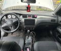 Сірий Міцубісі Lancer, об'ємом двигуна 1.6 л та пробігом 199 тис. км за 4000 $, фото 6 на Automoto.ua