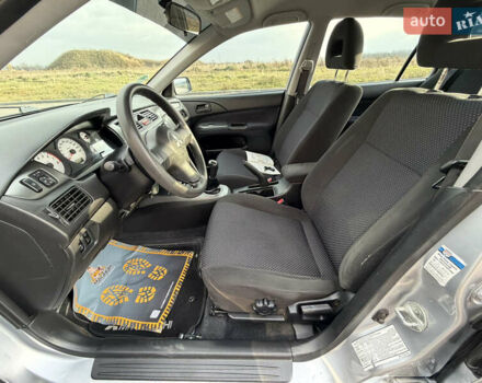Сірий Міцубісі Lancer, об'ємом двигуна 1.3 л та пробігом 160 тис. км за 4999 $, фото 43 на Automoto.ua